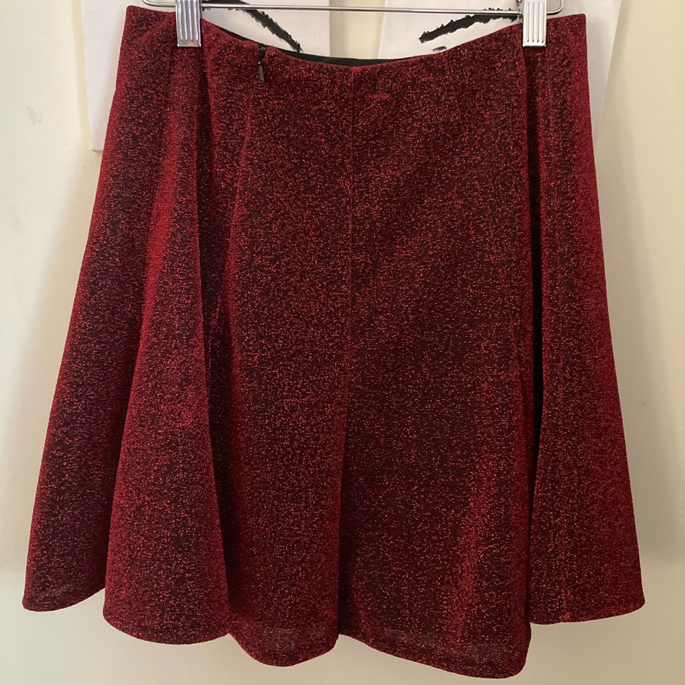 Pleated red sparkly mini skirt